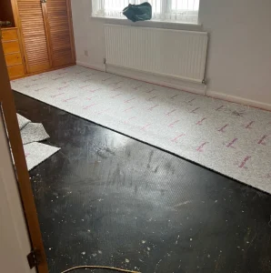 Preparing to install carpet in London House